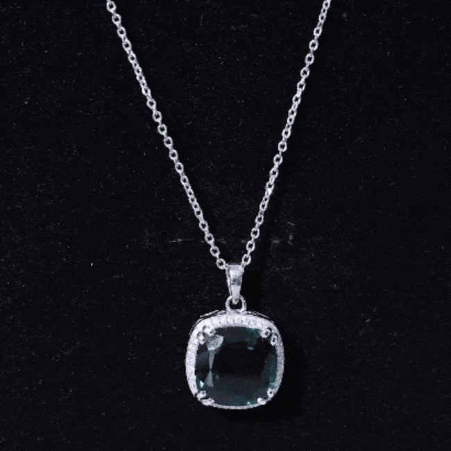 Lab-grown green sapphire pendant necklace by Rosec Jewels featuring a 9-carat statement design with a white background.