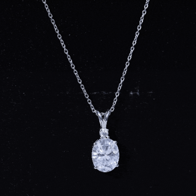 Oval 3.5 carat moissanite pendant with silver chain from Rosec Jewels, showcasing a sparkling solitaire design.