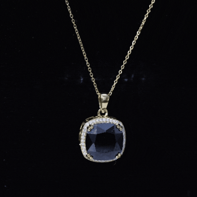 Yellow gold pendant featuring a 6-carat cushion cut lab-grown black and white diamond halo, from Rosec Jewels.