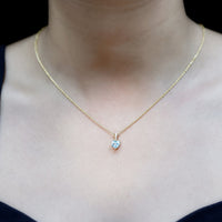 Swiss Blue Topaz and diamond heart pendant on chain, 0.9 carats, from Rosec Jewels, showcasing elegant jewelry design.