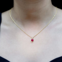 Natural 1 Carat Ruby Heart Pendant with Diamond Bail by Rosec Jewels, showcasing a sparkling ruby heart with elegant diamond accent.
