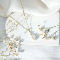 Pear Shaped 1.3 Carat Moissanite Pendant Necklace with Halo