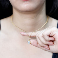 Pear Shaped 1.3 Carat Moissanite Pendant Necklace with Halo