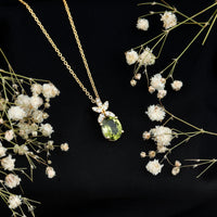 Oval peridot diamond flower pendant necklace for women with 1.7 carats, featuring elegant floral design by Rosec Jewels.