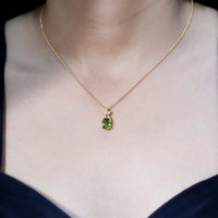 Oval 1.7 carat peridot flower pendant necklace for women with diamond accents by Rosec Jewels.