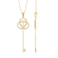 Vintage moissanite key pendant necklace by Rosec Jewels featuring a sparkling moissanite stone on a delicate chain