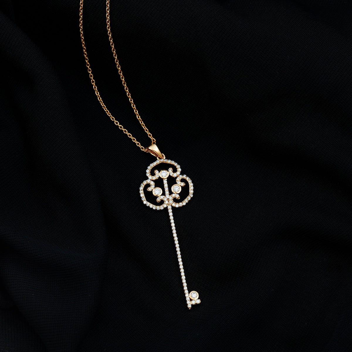 Vintage Moissanite key pendant necklace by Rosec Jewels featuring a sparkling moissanite gemstone on a delicate chain.