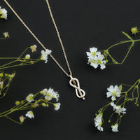 Minimal Moissanite Infinity Knot Pendant Necklace