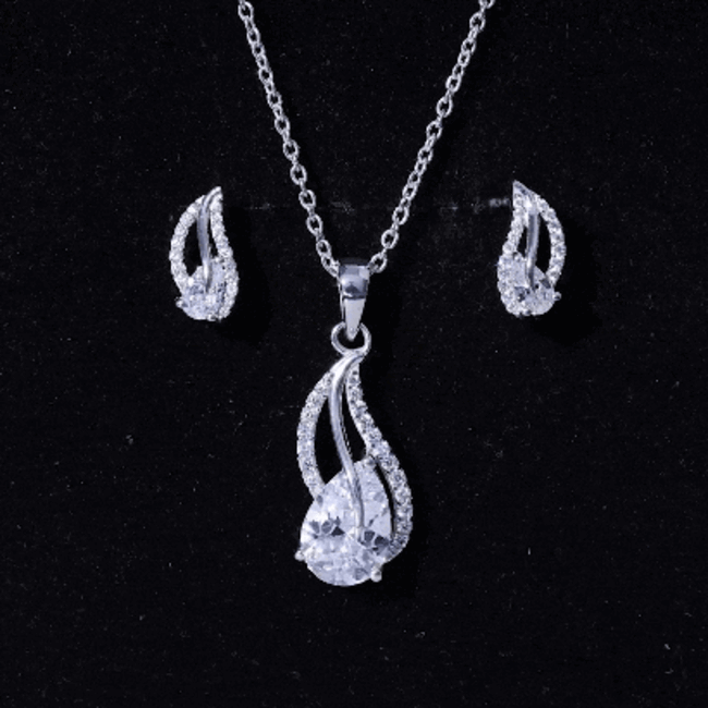 Rosec Jewels 3 Carat Pear-shaped cubic zirconia bridal jewelry set with silver necklace and matching earrings, elegant and sparkling.