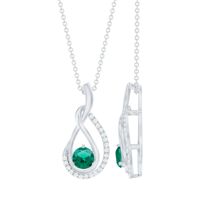 Silver teardrop pendant necklace featuring certified lab-grown emerald and moissanite stones with Rosec Jewels branding.