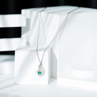 Certified Lab Grown Emerald and Moissanite Teardrop Necklace in Silver