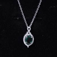 1.2 Carat Oval Cut Lab Grown Emerald Vintage Necklace in Silver