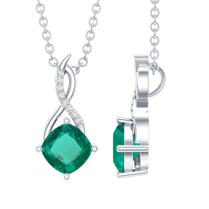 Cushion cut lab-created emerald infinity pendant with silver chain from Rosec Jewels, showcasing the vibrant green gemstone.