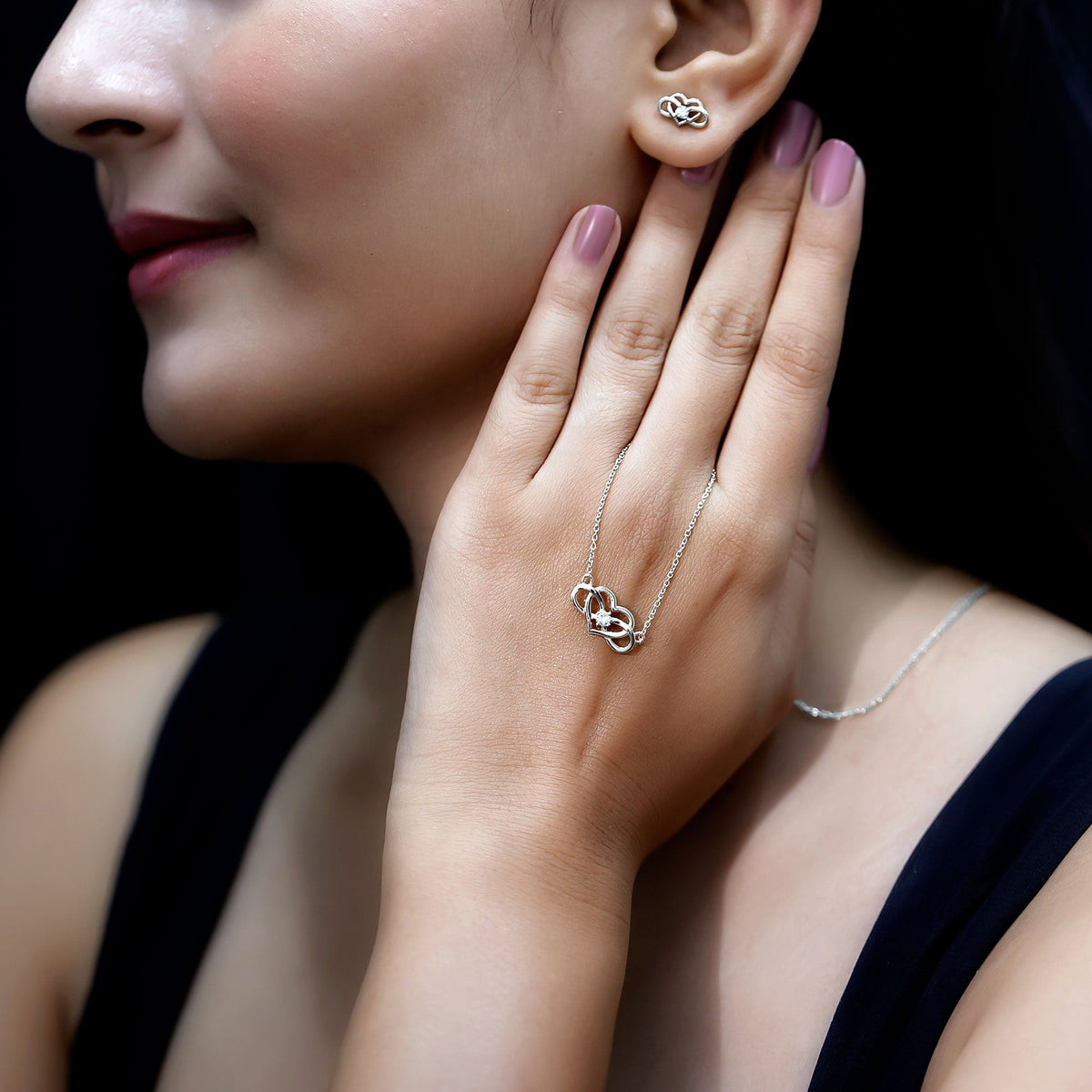 Round cut diamond infinity heart jewelry set by Rosec Jewels featuring sparkling diamonds and elegant design.