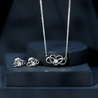 Round cut diamond infinity heart jewelry set featuring elegant design, crafted by Rosec Jewels with sparkling diamond accents.
