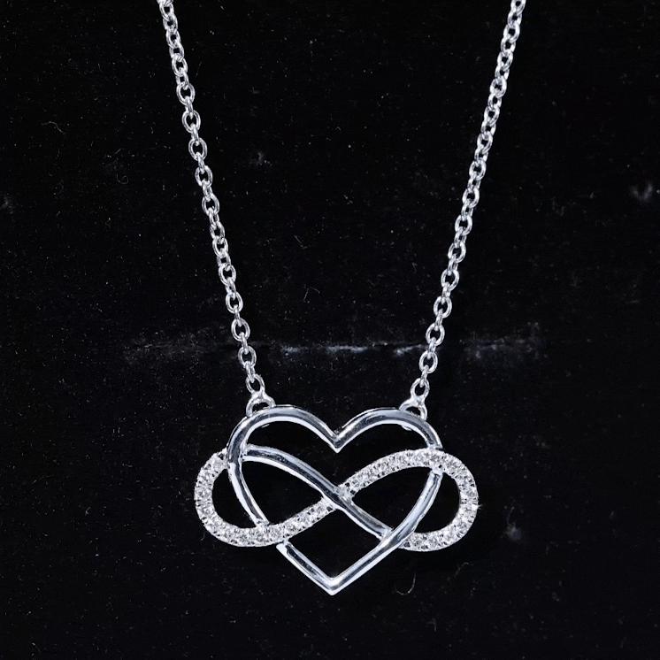 Yellow gold diamond infinity heart necklace by Rosec Jewels with sparkling diamonds and elegant design.