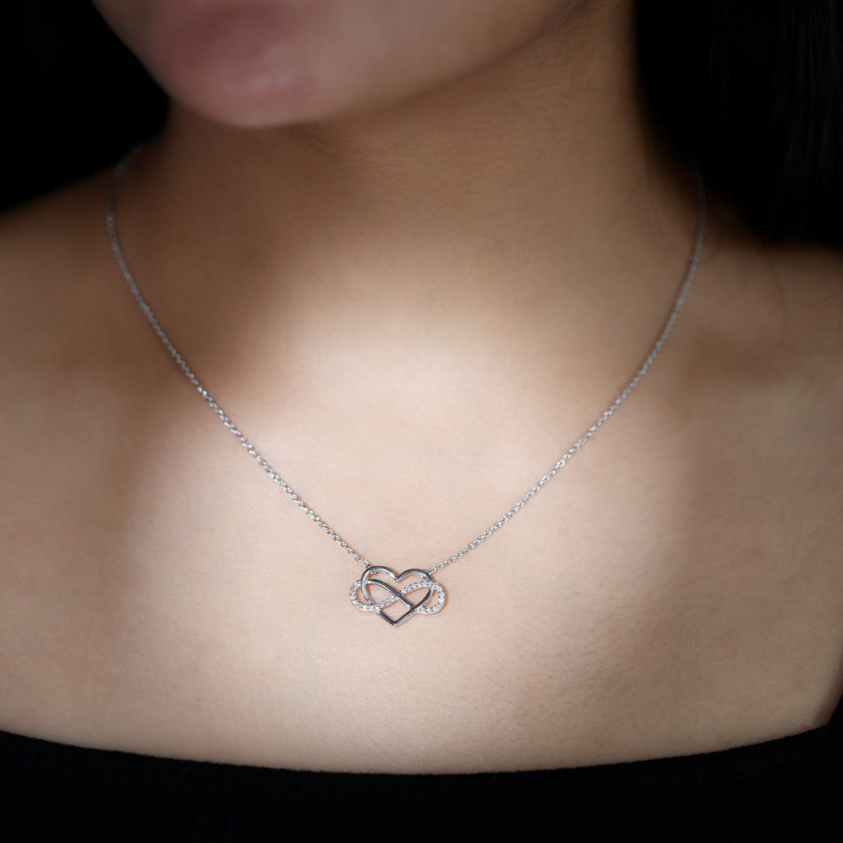 Rosec Jewels certified diamond infinity heart necklace with sparkling diamonds on a delicate chain, elegant jewelry for special occasions.