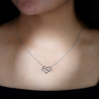Rosec Jewels certified diamond infinity heart necklace with sparkling diamonds on a delicate chain, elegant jewelry for special occasions.