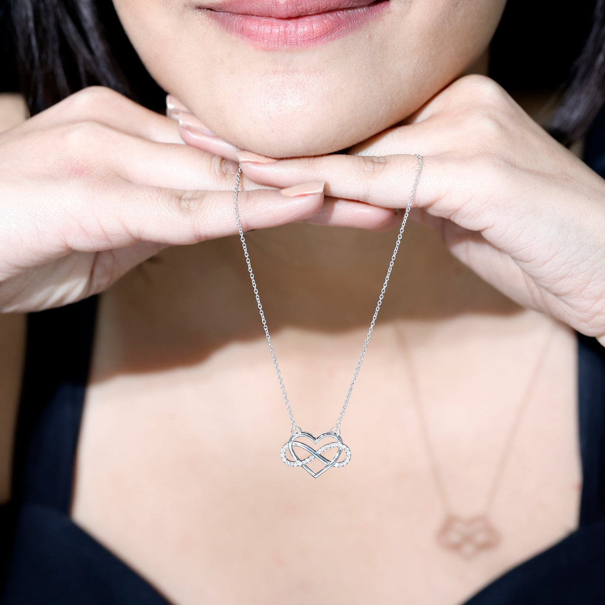 Rosec Jewels Certified Diamond Infinity Heart Necklace featuring sparkling diamonds and a delicate infinity heart design.