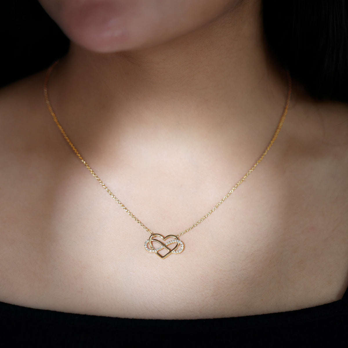 Certified diamond infinity heart necklace by Rosec Jewels featuring a delicate chain with sparkling diamond accents.