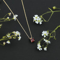 Genuine Princess Cut Garnet Solitaire Locket With Chain