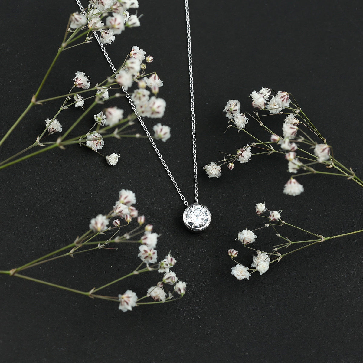 Bezel Set 1.36 Carat Round Moissanite Necklace in Silver