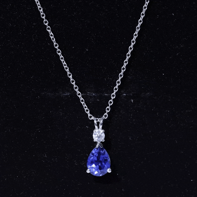 Lab-grown 1.6 carat blue sapphire teardrop pendant on silver chain, crafted by Rosec Jewels, elegant jewelry accessory.
