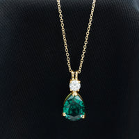 Lab Grown Emerald Teardrop Pendant with Moissanite