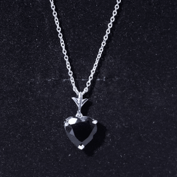 Natural black spinel heart pendant necklace for women by Rosec Jewels, featuring a polished black spinel gemstone on a delicate chain.
