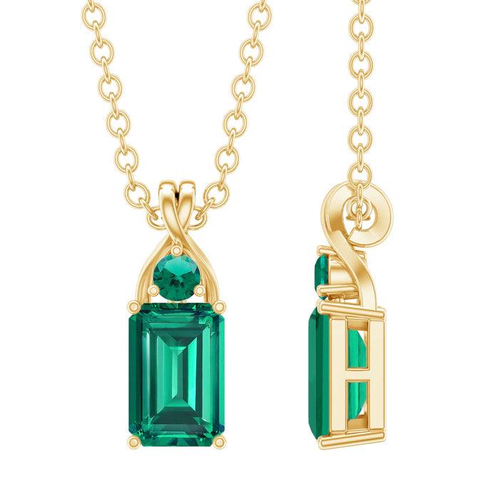 Emerald cut lab-created emerald pendant necklace by Rosec Jewels, showcasing a sparkling green gemstone on a delicate chain.