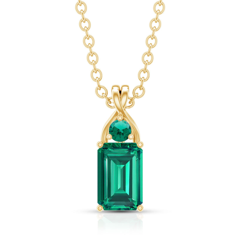 Emerald cut lab-created emerald pendant necklace by Rosec Jewels featuring a sparkling green gemstone and delicate chain.
