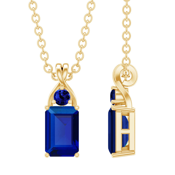 Elegant 1.75 CT lab-created blue sapphire emerald cut pendant from Rosec Jewels, showcasing a sparkling blue gemstone.
