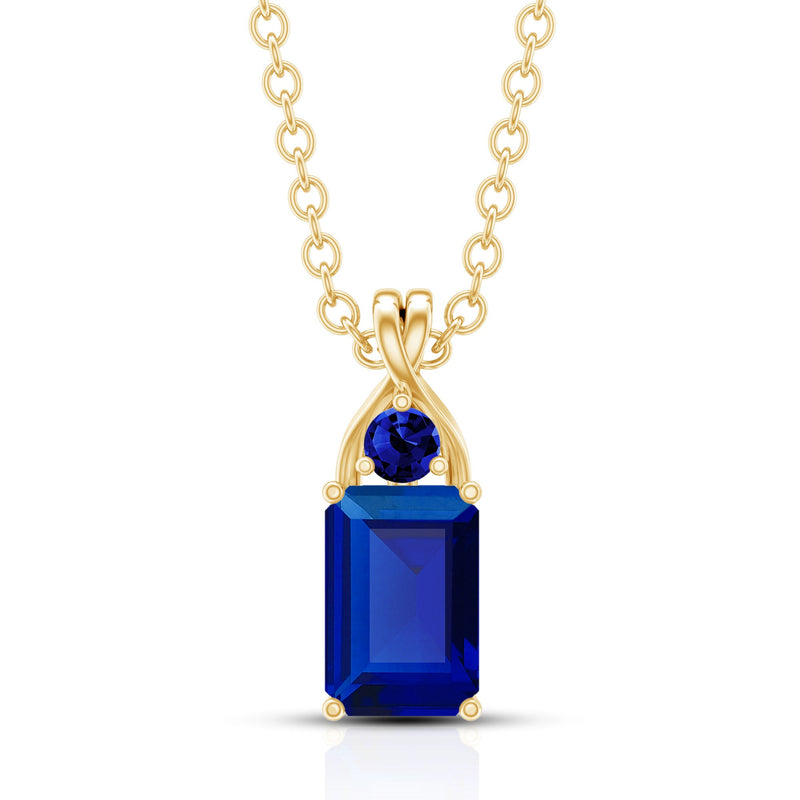 Emerald cut lab-created blue sapphire pendant from Rosec Jewels featuring a 1.75 CT center stone on a silver chain.