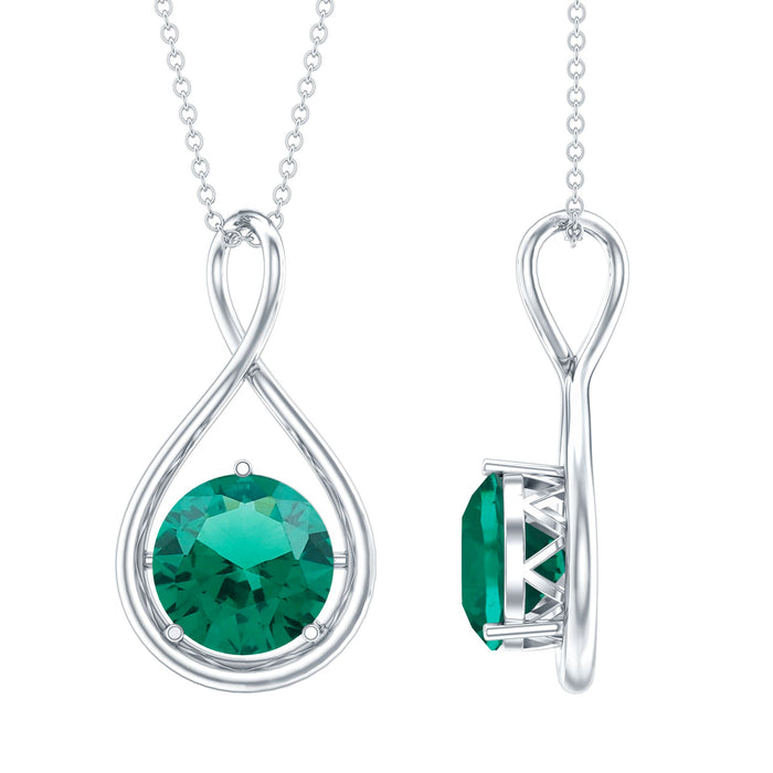 Rosec Jewels AAAA Grade 3.5 Carat Lab Created Emerald infinity pendant on a silver chain, close-up view of the pendant and chain.