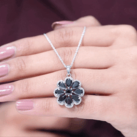 Black Spinel flower pendant with Moissanite halo, from Rosec Jewels, featuring intricate floral design and sparkling gemstone accents.