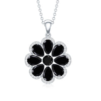 Black spinel flower pendant necklace with moissanite halo from Rosec Jewels, featuring a detailed floral design and sparkling accents.