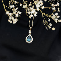 Certified London Blue Topaz Teardrop Necklace with Moissanite Halo