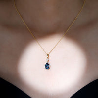 Certified London Blue Topaz Teardrop Necklace with Moissanite Halo