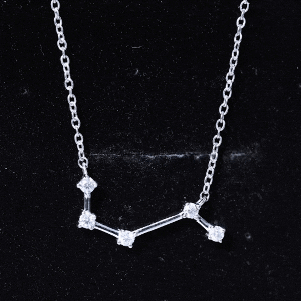 Yellow moissanite Aries constellation pendant necklace for women by Rosec Jewels, featuring star-shaped design and sparkling stones.