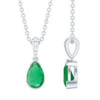 Pear cut emerald solitaire pendant with diamond accent bail from Rosec Jewels, featuring a silver chain and elegant gemstone setting.