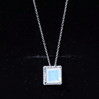 Yellow 2 Carat princess cut Ethiopian opal solitaire necklace with rope frame from Rosec Jewels, showcasing the elegant pendant design.
