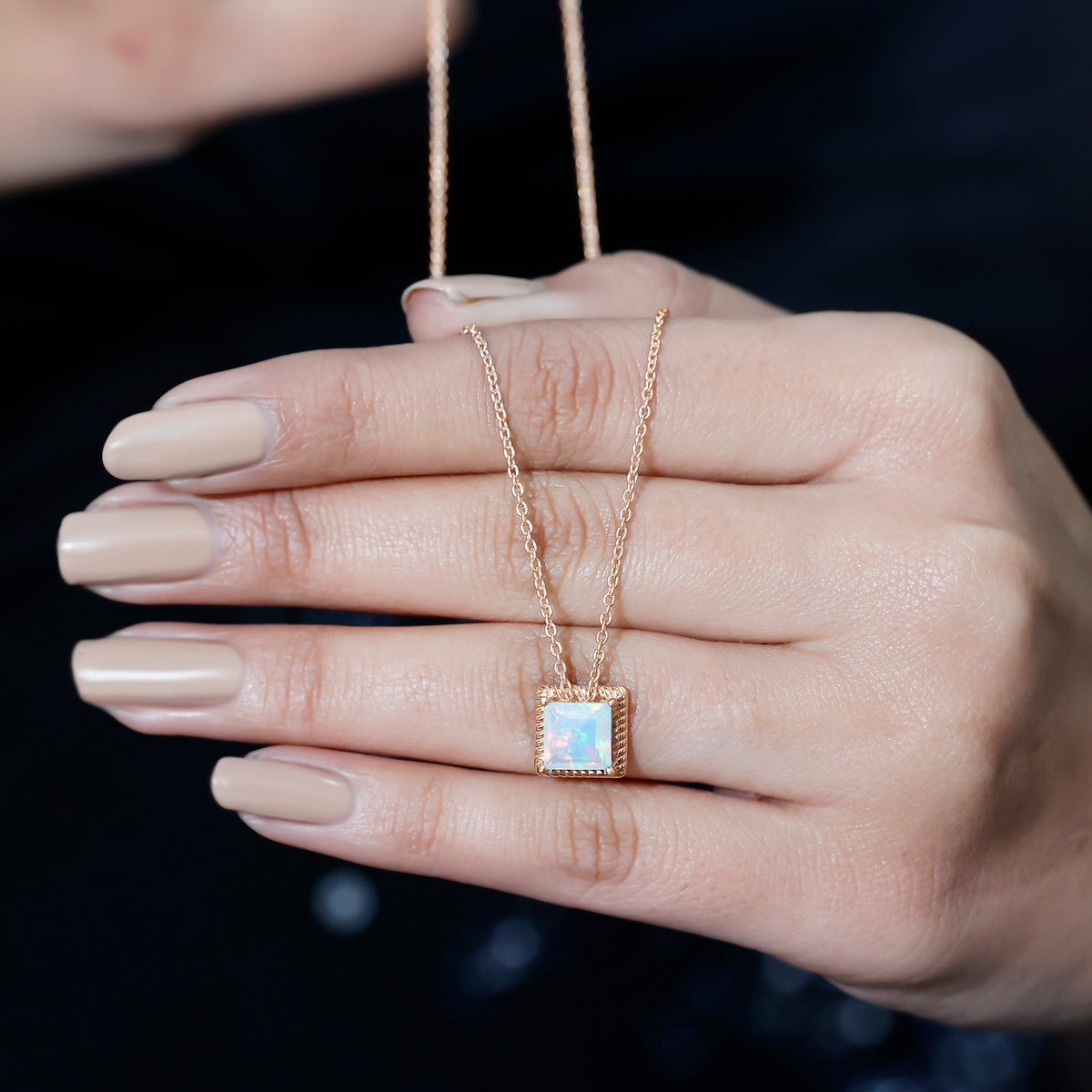 Ethiopian Opal solitaire princess cut necklace with rope frame by Rosec Jewels, showcasing a 2 carat opal pendant on a delicate chain.