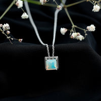 Ethiopian opal solitaire necklace with 2 carat princess cut stone and rope frame, featuring Rosec Jewels branding.