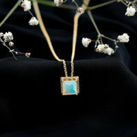 Ethiopian opal solitaire necklace with a princess cut 2 carat gemstone set in a rope frame by Rosec Jewels