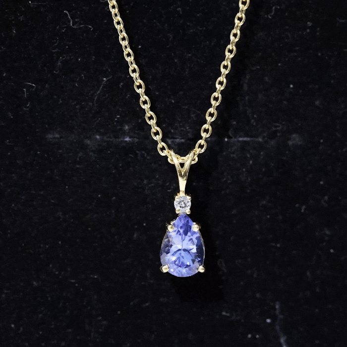 Yellow tanzanite teardrop pendant necklace with diamond accent, elegant jewelry piece from Rosec Jewels.
