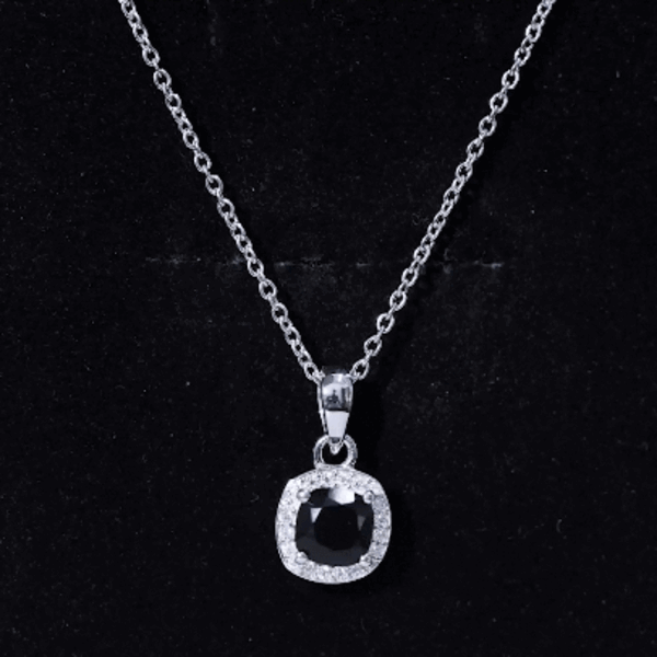Cushion cut 2 carat black onyx and moissanite halo pendant with silver chain from Rosec Jewels.