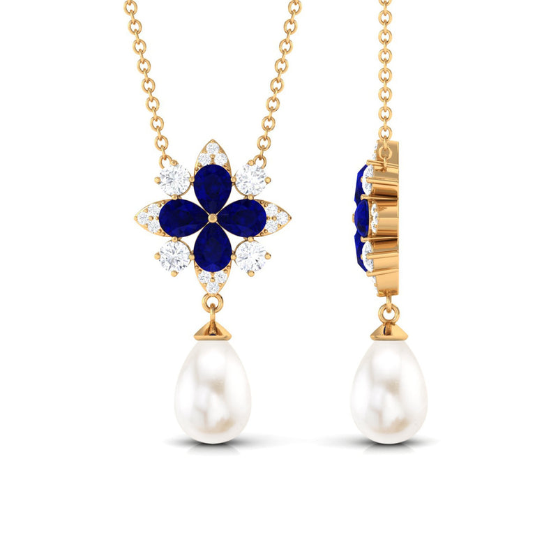 Blue sapphire and moissanite flower pendant with freshwater pearl drop, showcasing elegant jewelry design by Rosec Jewels.