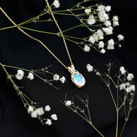 Oval Ethiopian Opal Necklace with Moissanite Twisted Bail