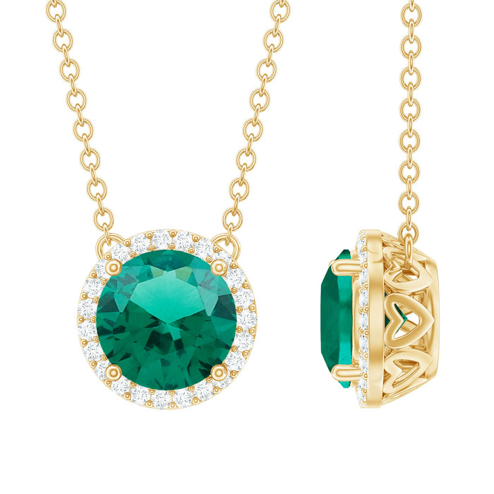 Two-carat round lab-created emerald pendant with diamond halo, showcasing elegant jewelry design by Rosec Jewels.