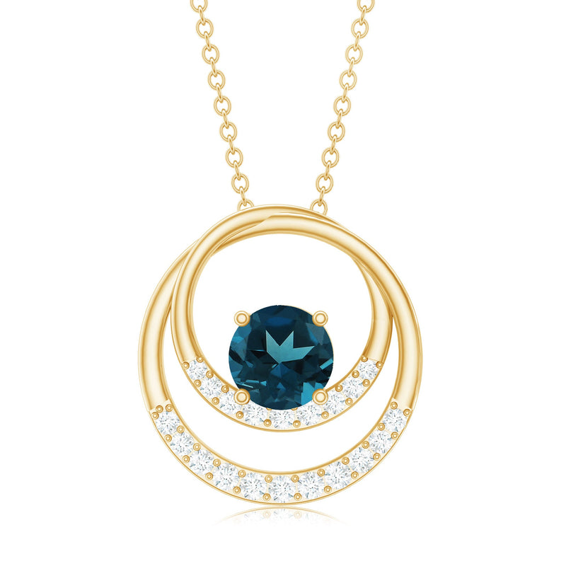London Blue Topaz and diamond interlocking circle pendant by Rosec Jewels, featuring a blue gemstone and sparkling diamonds.